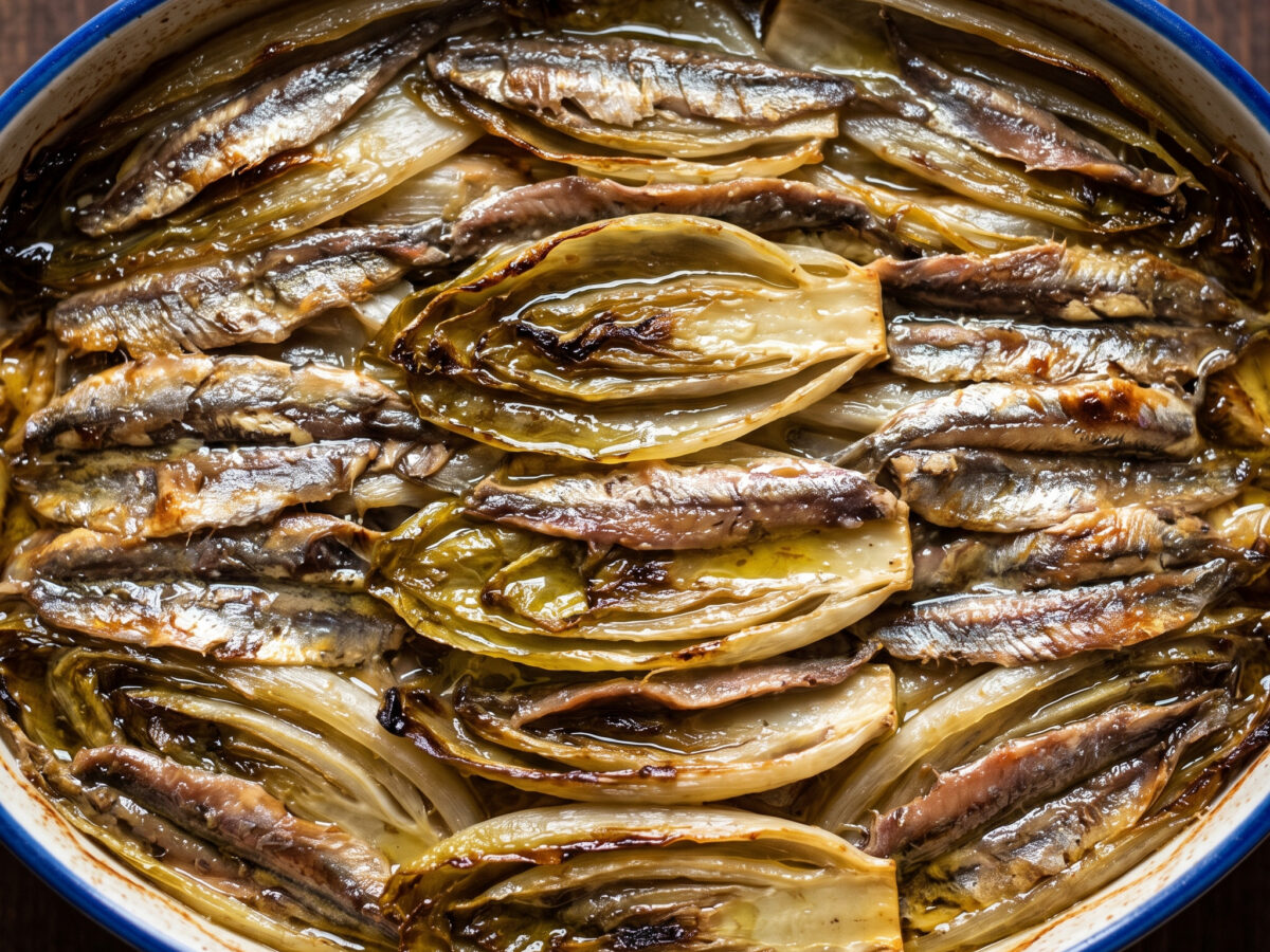 Aliciotti con indivia: römische Fischvorspeise