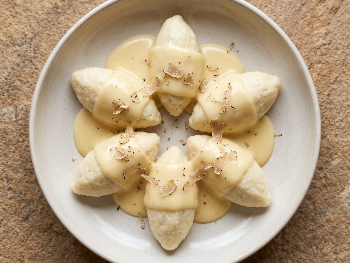 Morbidelle di ricotta mit Montasio-Fonduta